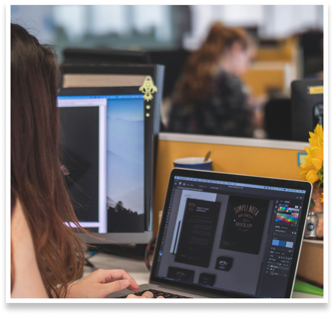girl designing stationery on a laptop